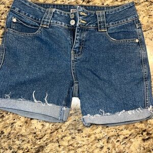 Lot of women’s three tops and three shorts.